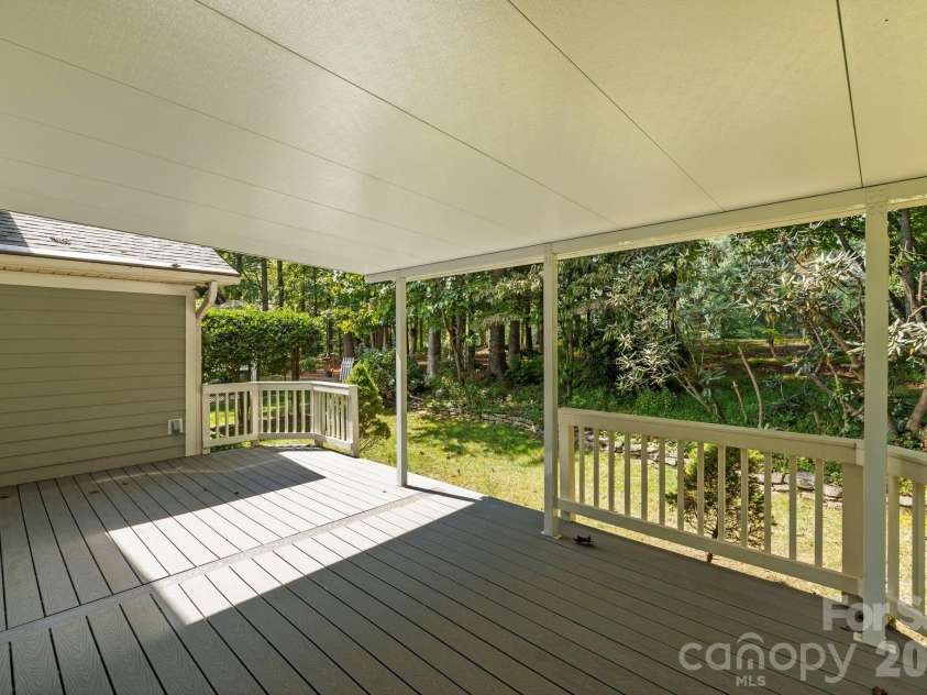 241 Fairway View Drive, Etowah, NC 28729.  MLS# CAR4304614, YatesRealty ID 2187. Large covered section of the back porch