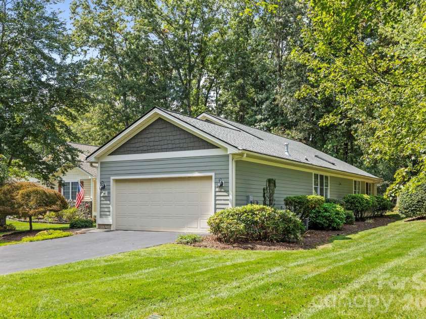 241 Fairway View Drive, Etowah, NC 28729.  MLS# CAR4304614, YatesRealty ID 2187. Large side yard