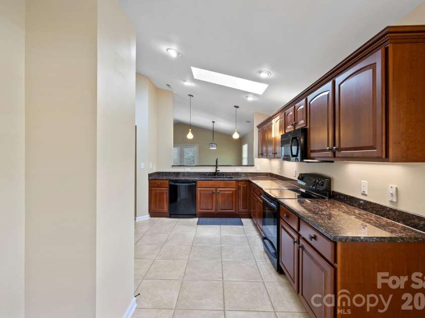 241 Fairway View Drive, Etowah, NC 28729.  MLS# CAR4304614, YatesRealty ID 2187. Lots of storage and counter space