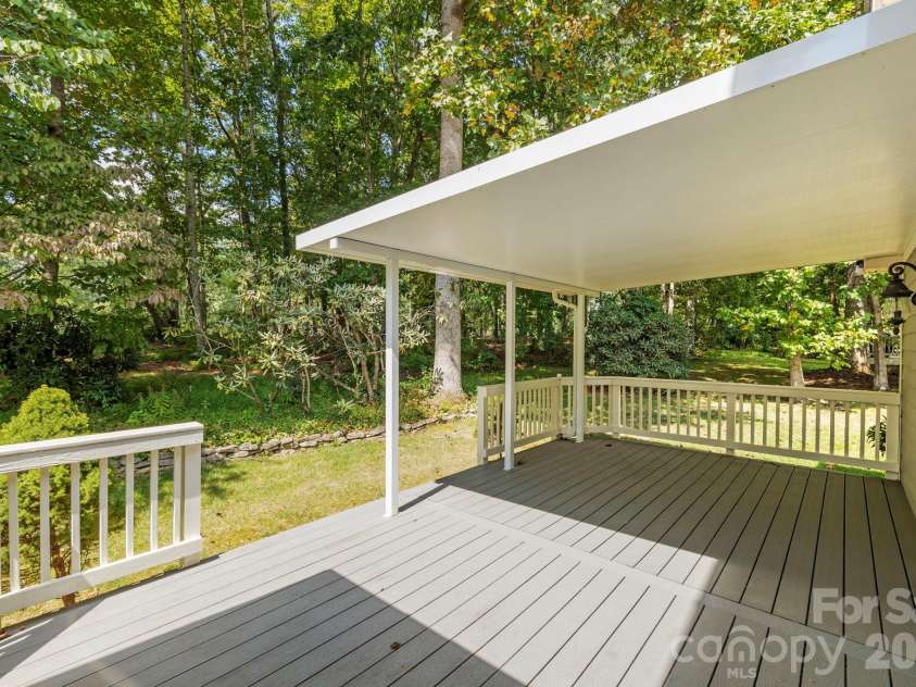 241 Fairway View Drive, Etowah, NC 28729.  MLS# CAR4304614, YatesRealty ID 2187. Uncovered section of back porch for sun and grilling!