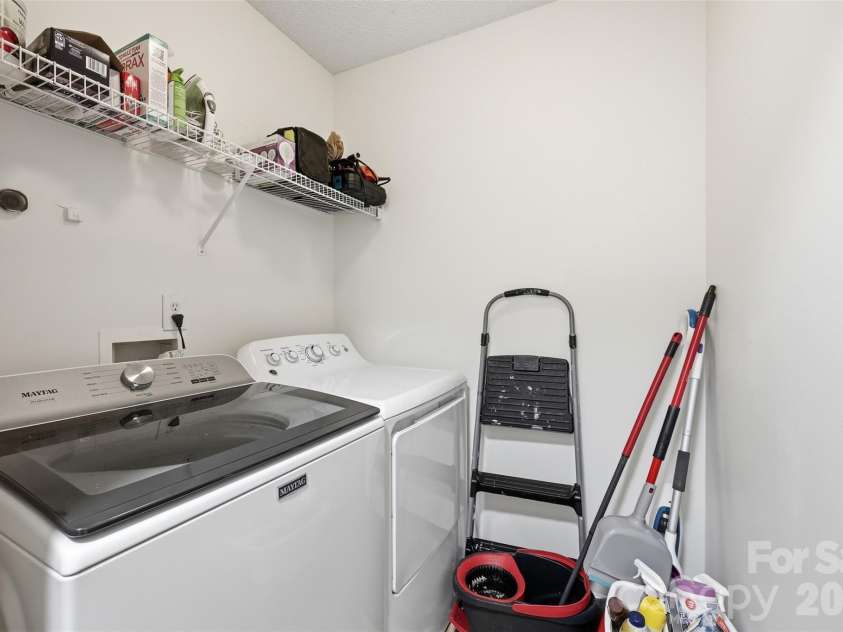 104 Gelderland Drive, Matthews, NC 28104.  MLS# CAR4378988, YatesRealty ID 21873. Laundry
