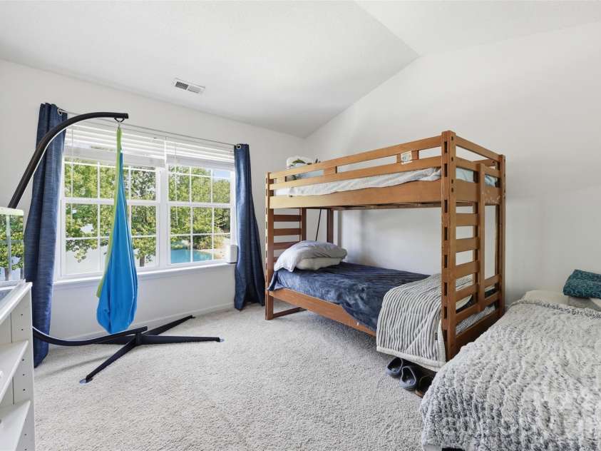 104 Gelderland Drive, Matthews, NC 28104.  MLS# CAR4378988, YatesRealty ID 21873. Second bedroom 