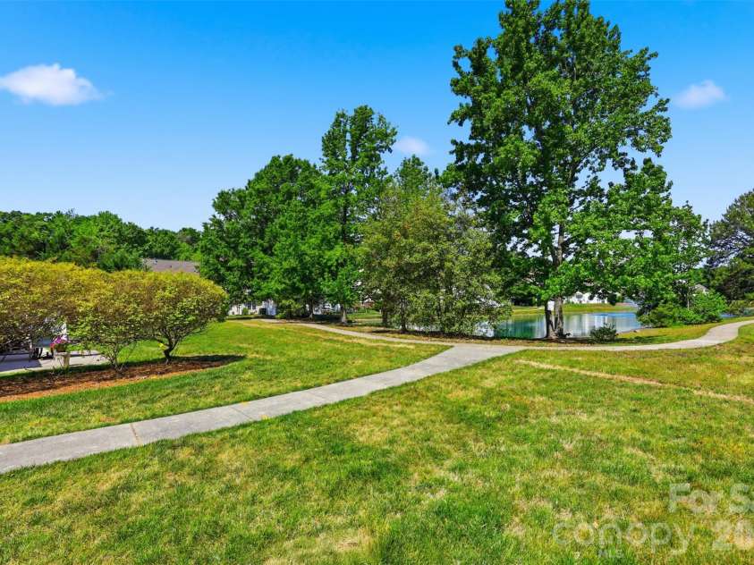 104 Gelderland Drive, Matthews, NC 28104.  MLS# CAR4378988, YatesRealty ID 21873. Walking trail 