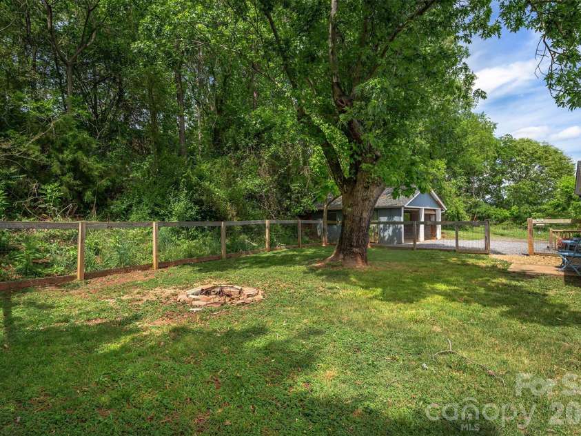 477 Emma Road, Asheville, NC 28806.  MLS# CAR4378114, YatesRealty ID 21881. Fire pit!