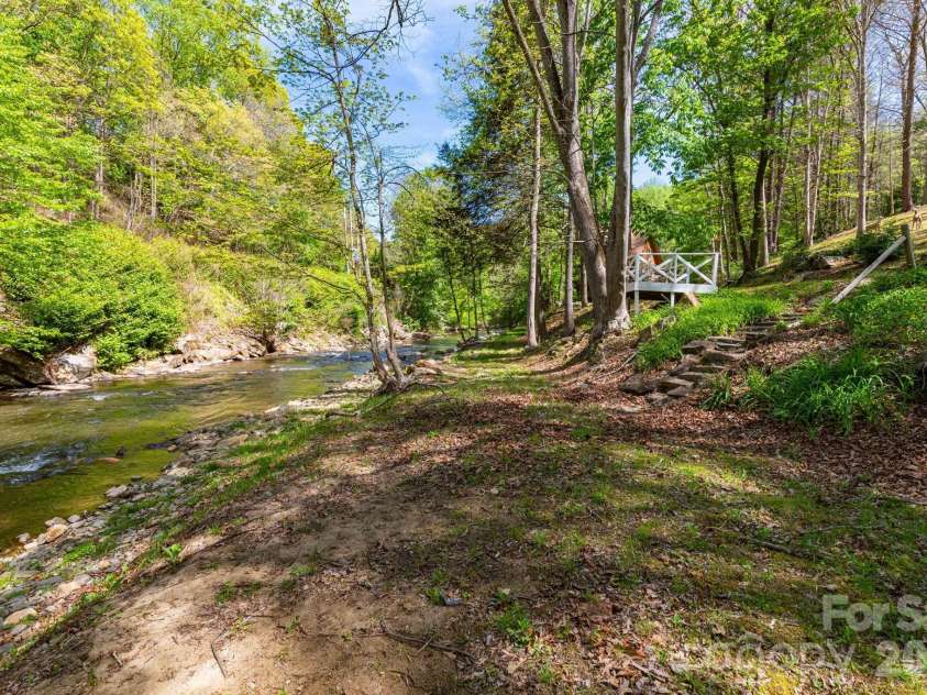 87 Medley Drive, Waynesville, NC 28785.  MLS# CAR4375332, YatesRealty ID 21884. Creek Access