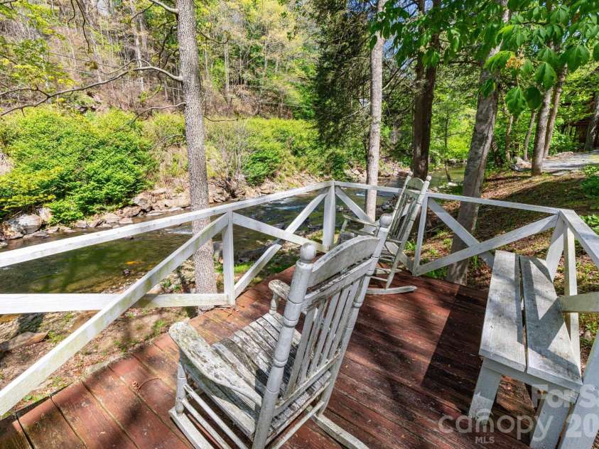 87 Medley Drive, Waynesville, NC 28785.  MLS# CAR4375332, YatesRealty ID 21884. Deck overlooking Jonathan Creek