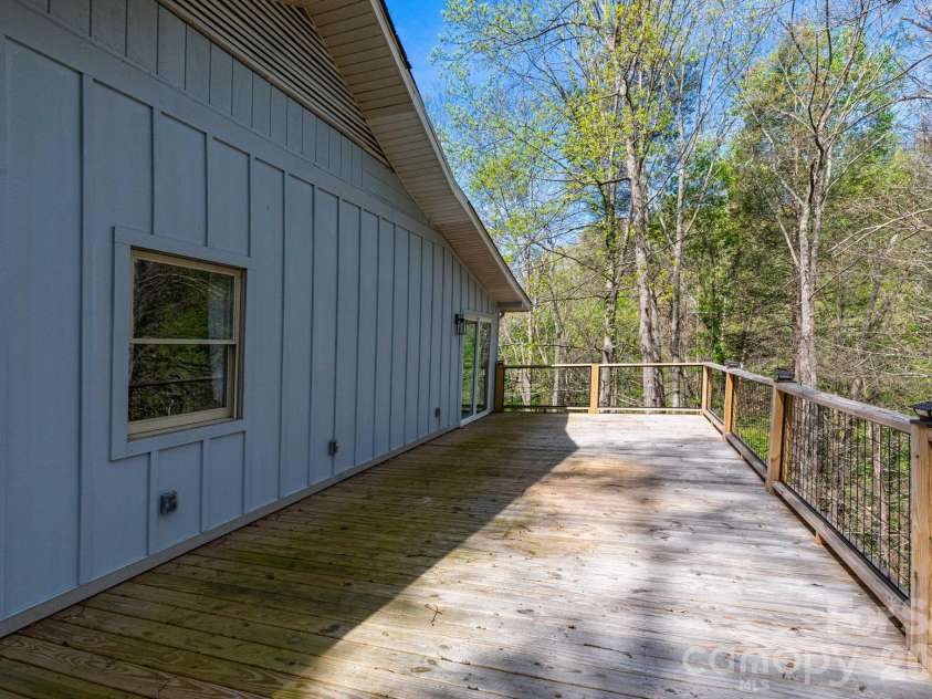 87 Medley Drive, Waynesville, NC 28785.  MLS# CAR4375332, YatesRealty ID 21884. Main Level Deck