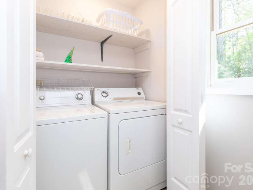 87 Medley Drive, Waynesville, NC 28785.  MLS# CAR4375332, YatesRealty ID 21884. Main Level Hall Bathroom & Laundry