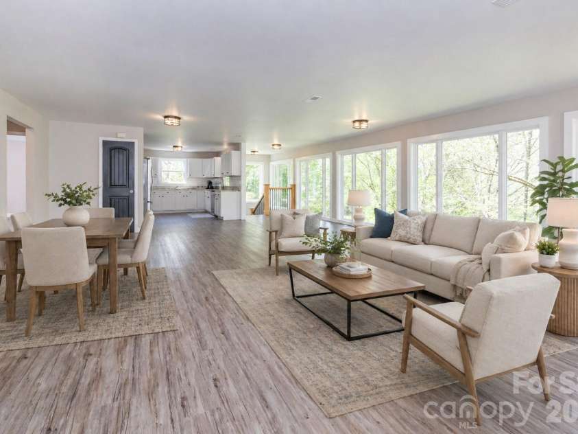 87 Medley Drive, Waynesville, NC 28785.  MLS# CAR4375332, YatesRealty ID 21884. Main Level Living/Dining Area - VIRTUALLY STAGED