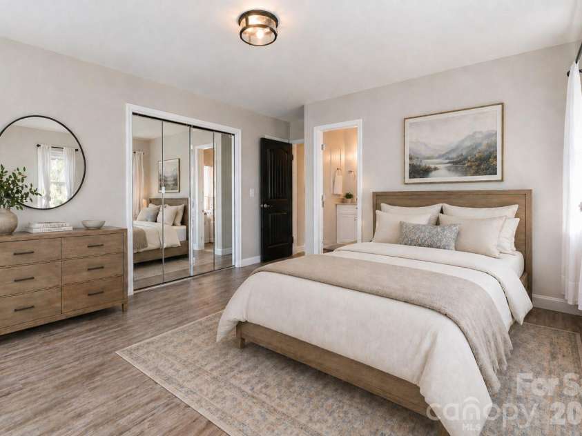 87 Medley Drive, Waynesville, NC 28785.  MLS# CAR4375332, YatesRealty ID 21884. Main Level Primary Bedroom - VIRTUALLY STAGED