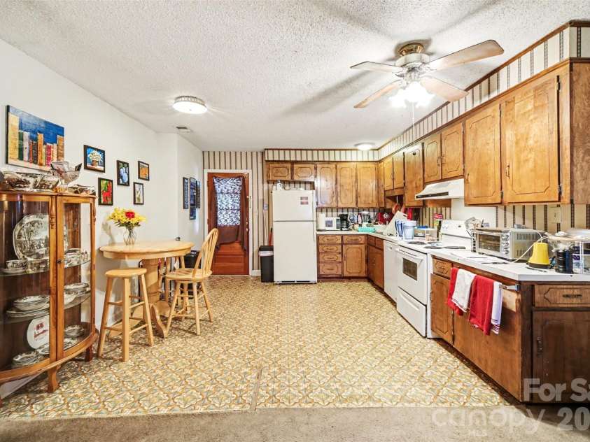 6100/6102 Pleasant Grove Road, Charlotte, NC 28216.  MLS# CAR4359326, YatesRealty ID 21887. 6102