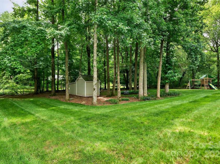 8300 Quarters Lane, Mint Hill, NC 28227.  MLS# CAR4271325, YatesRealty ID 21887. Large secluded backyard