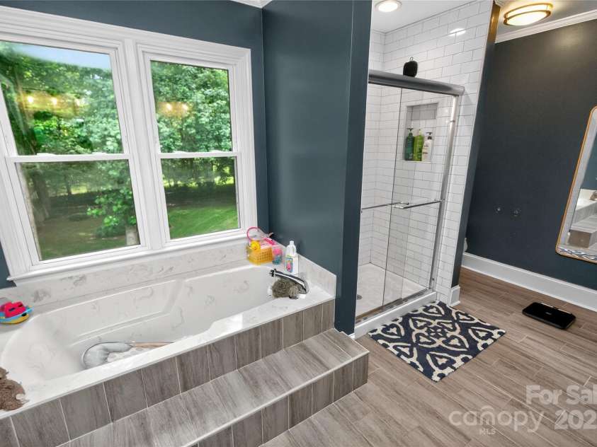 8300 Quarters Lane, Mint Hill, NC 28227.  MLS# CAR4271325, YatesRealty ID 21887. Large soaking tub or shower, your choice