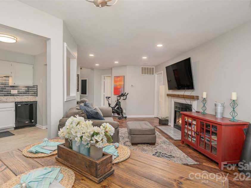 6501 Clavell Lane, Charlotte, NC 28210.  MLS# CAR4320627, YatesRealty ID 2189. Unit is no longer furnished.  TV over the mantle may remain