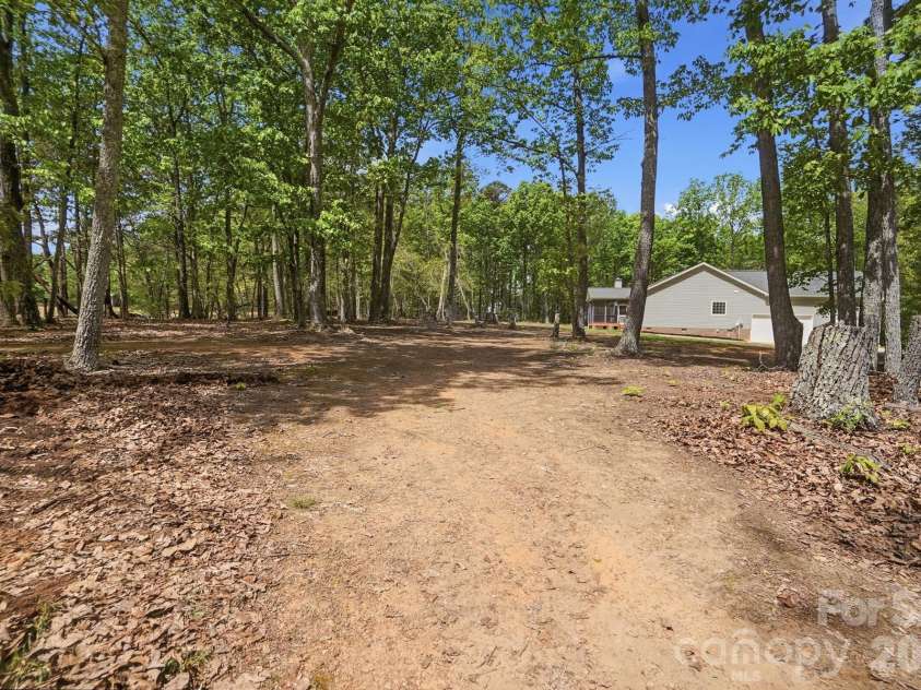 2430 Shuford Road, Lincolnton, NC 28092.  MLS# CAR4370608, YatesRealty ID 21893. Cleared area/paths on property
