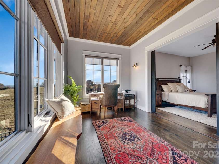 23 Thunder Mountain Road, Hendersonville, NC 28792.  MLS# CAR4213097, YatesRealty ID 21895. Beautiful sunlit sitting room/office connected to primary suite with private entrance to the main deck