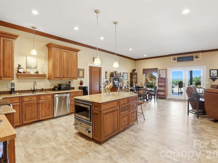 502 Lake Shore Drive, Norwood, NC 28128.  MLS# CAR4376520, YatesRealty ID 21896. Main level kitchen