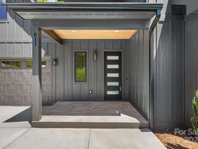 611 Crystal Heights Drive, Hendersonville, NC 28739.  MLS# CAR4263077, YatesRealty ID 21896. Front Porch with tile