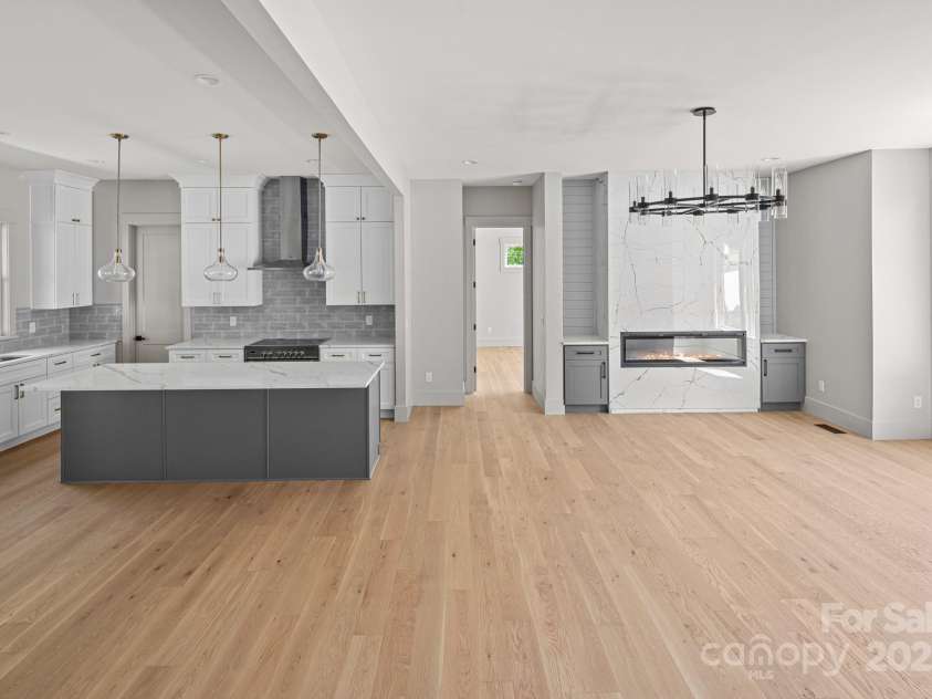 611 Crystal Heights Drive, Hendersonville, NC 28739.  MLS# CAR4263077, YatesRealty ID 21896. Open Living Space looking into Master Bedroom