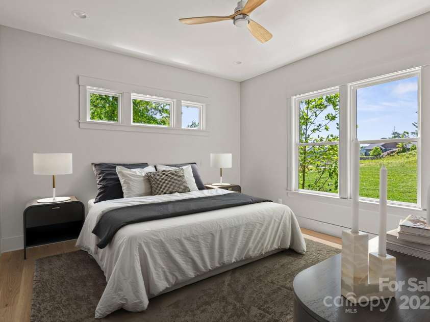 611 Crystal Heights Drive, Hendersonville, NC 28739.  MLS# CAR4263077, YatesRealty ID 21896. Staged master Bedroom