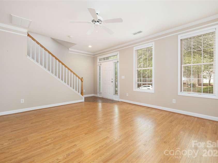 181 Singleton Road, Mooresville, NC 28117.  MLS# CAR4268089, YatesRealty ID 21897. Living Room overlooks the tree-lined street