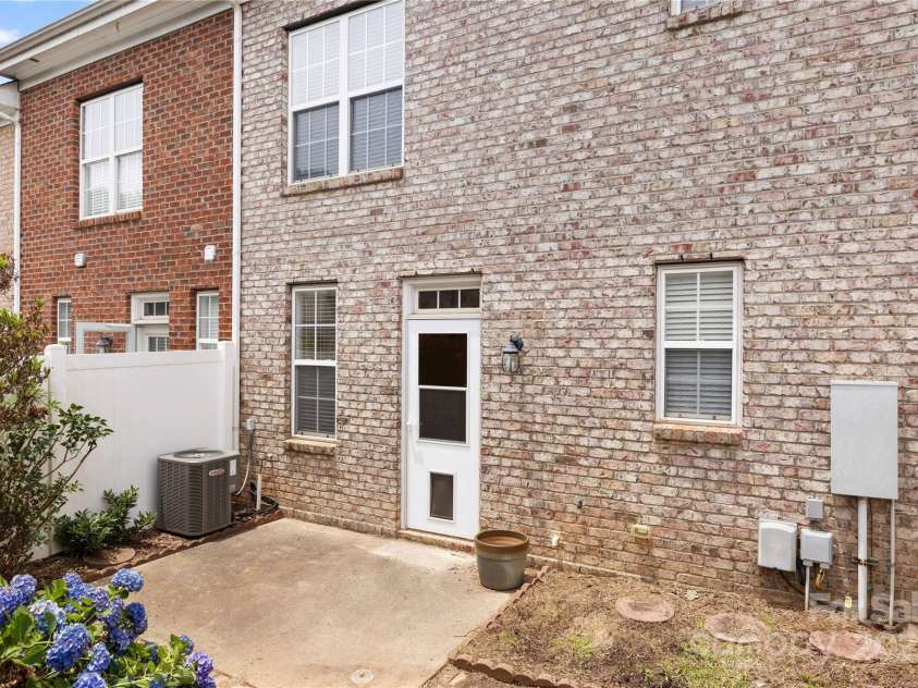 181 Singleton Road, Mooresville, NC 28117.  MLS# CAR4268089, YatesRealty ID 21897. Private and cozy enclosed patio