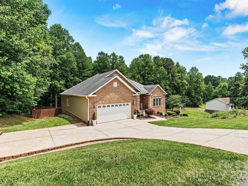 1616 Indian Springs Drive, Conover, NC 28613.  MLS# CAR4268711, YatesRealty ID 21899. Focused Side/Drive View