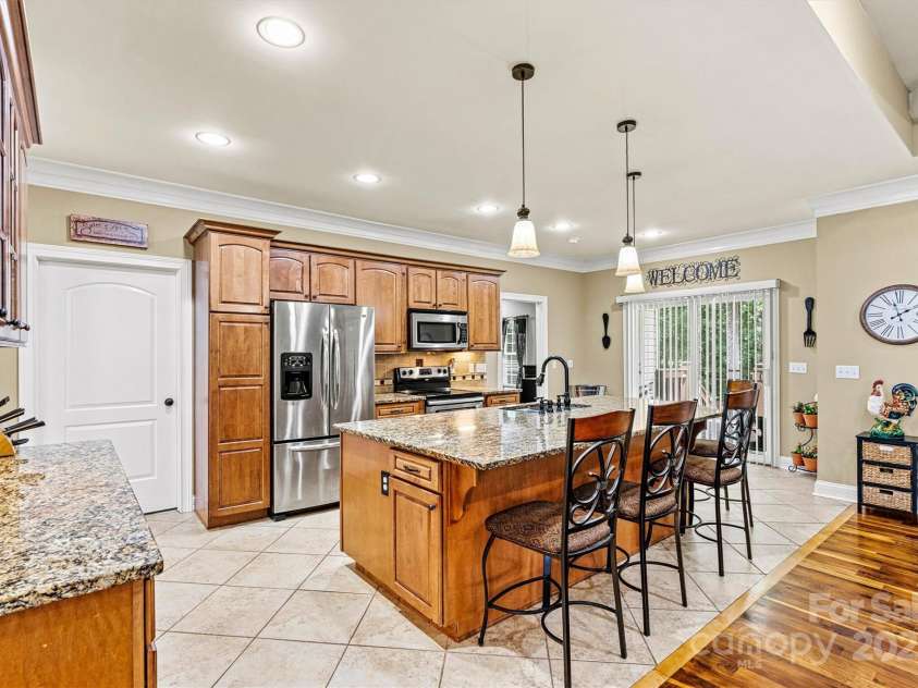 1616 Indian Springs Drive, Conover, NC 28613.  MLS# CAR4268711, YatesRealty ID 21899. Kitchen/Covered Back Deck Entry View