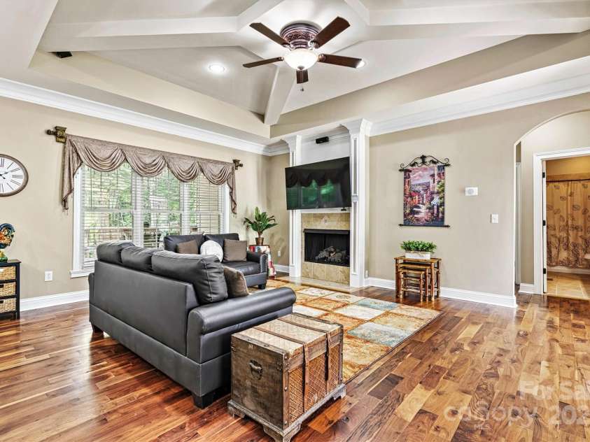 1616 Indian Springs Drive, Conover, NC 28613.  MLS# CAR4268711, YatesRealty ID 21899. Living Room/Back Covered Deck/Hall Entry View