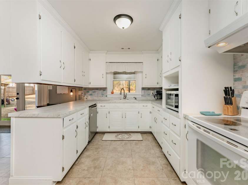 1212 Rowan Mills Road, Salisbury, NC 28147.  MLS# CAR4325486, YatesRealty ID 21900. 