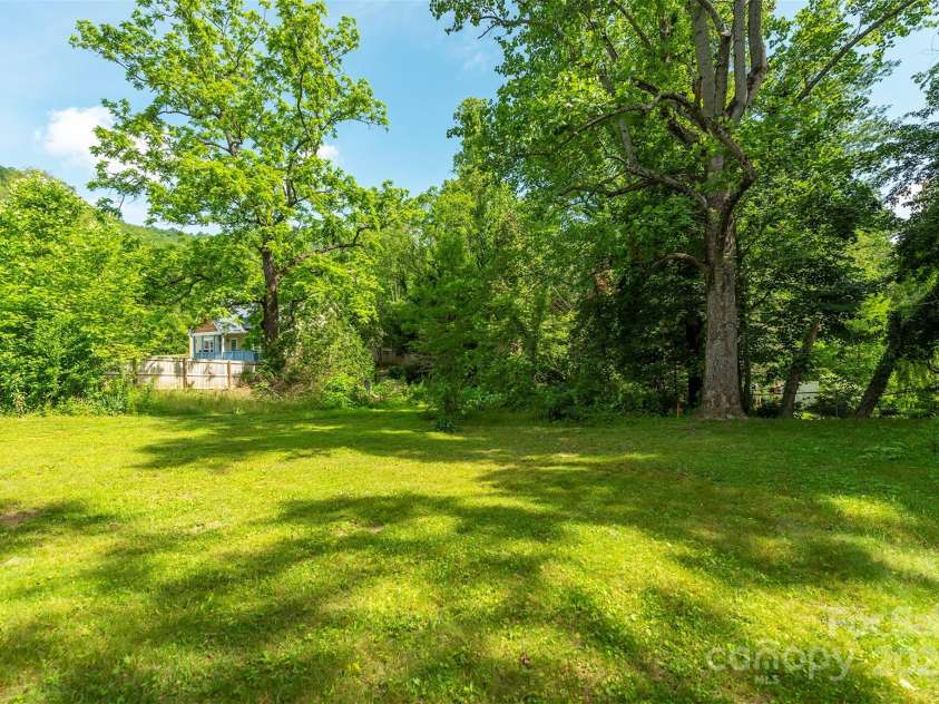 12 Mountain View Avenue, Black Mountain, NC 28711.  MLS# CAR4269712, YatesRealty ID 21904. Back yard area
