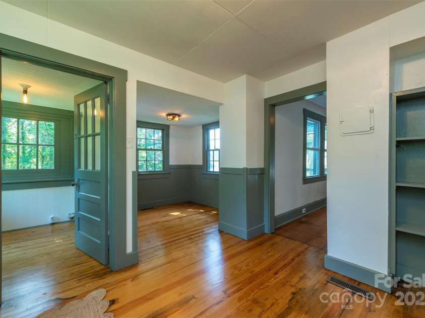 12 Mountain View Avenue, Black Mountain, NC 28711.  MLS# CAR4269712, YatesRealty ID 21904. Kitchen looking into laundry area and dining nook