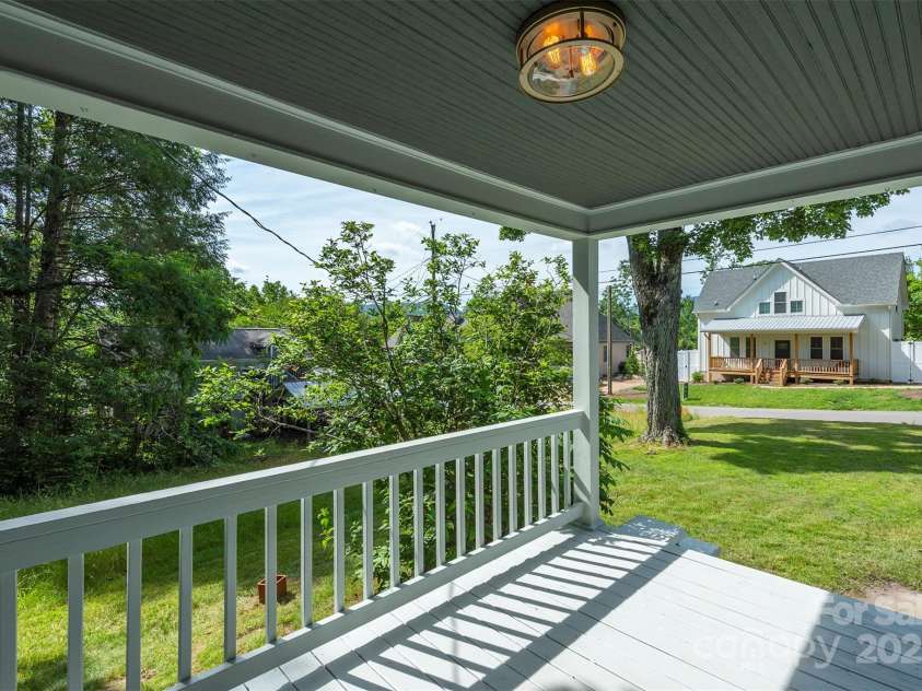 12 Mountain View Avenue, Black Mountain, NC 28711.  MLS# CAR4269712, YatesRealty ID 21904. Side porch