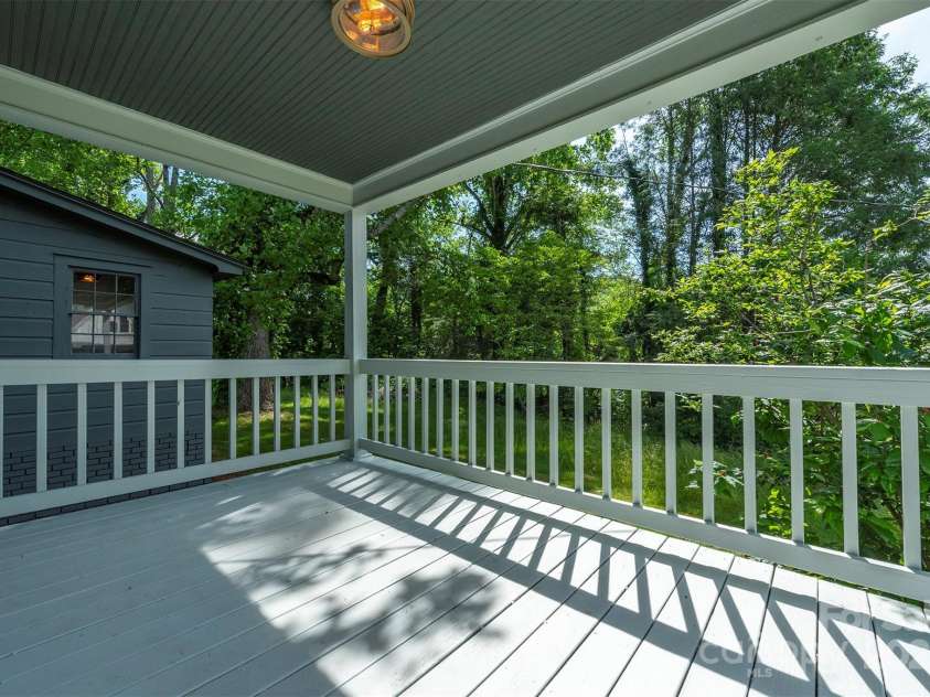 12 Mountain View Avenue, Black Mountain, NC 28711.  MLS# CAR4269712, YatesRealty ID 21904. Side porch