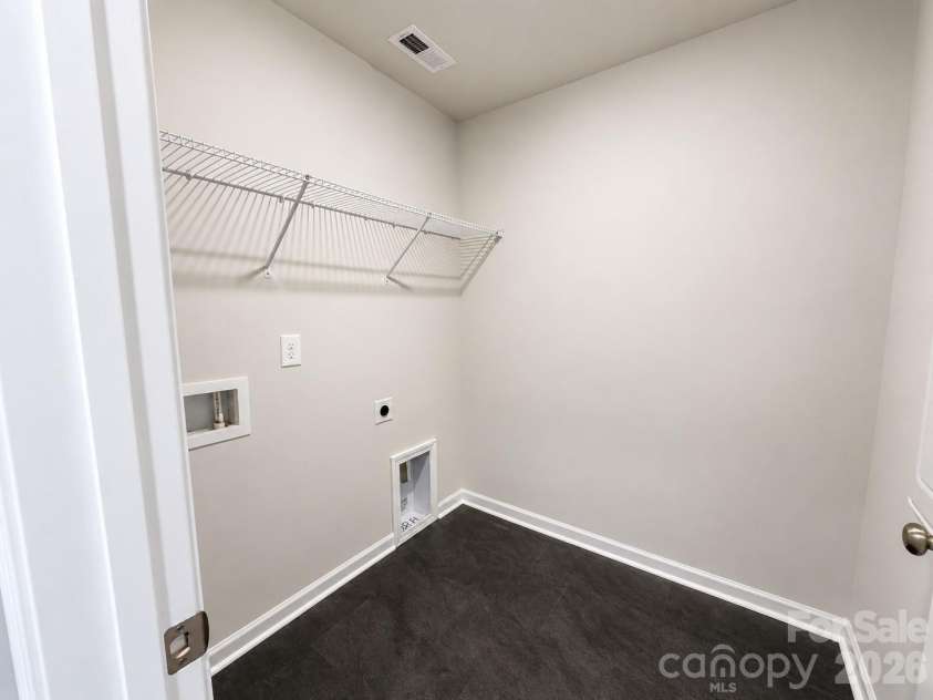 577 Cape Cod Way, Rock Hill, SC 29732.  MLS# CAR4354156, YatesRealty ID 21906. 2nd Floor Laundry