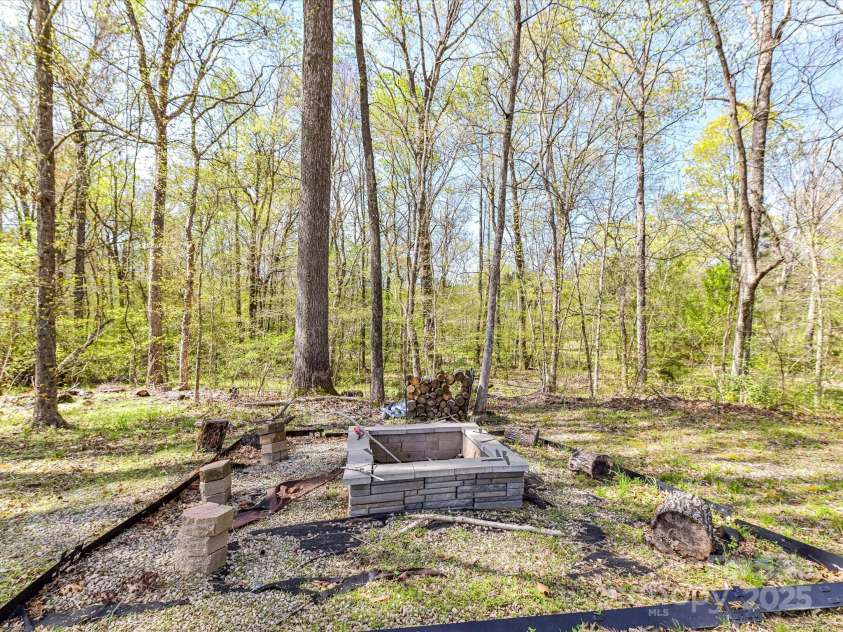 7507 Reedy Creek Road, Charlotte, NC 28215.  MLS# CAR4233019, YatesRealty ID 21908. Fire Pit Area