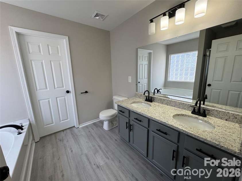 9019 Newfield Street, Charlotte, NC 28216.  MLS# CAR4377935, YatesRealty ID 21909. 