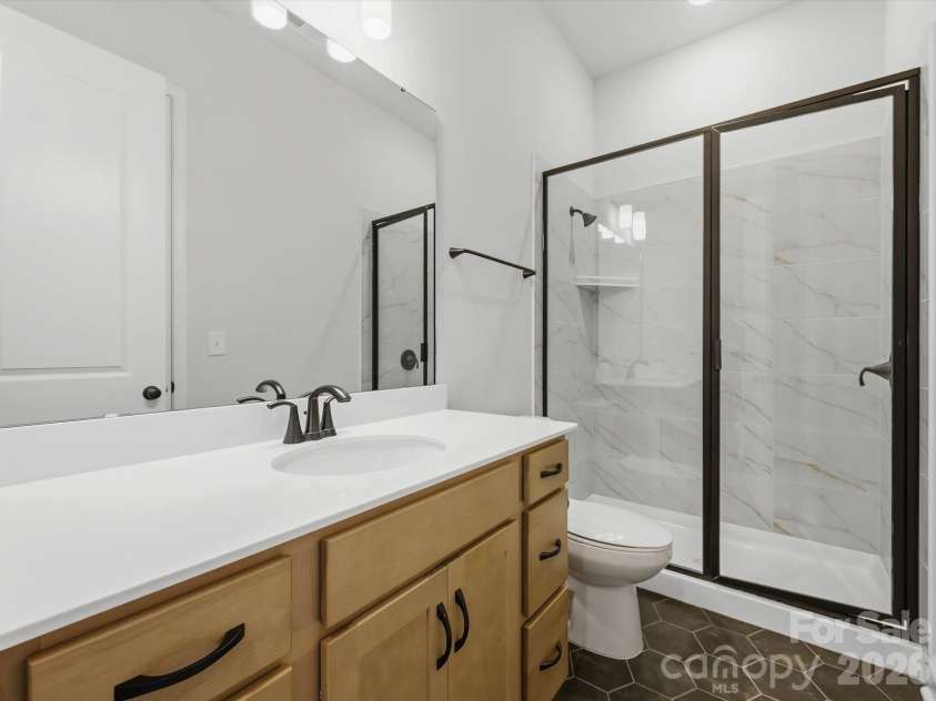 16024 Cloud Nine Court, Matthews, NC 28105.  MLS# CAR4349427, YatesRealty ID 21910. First Floor Bath
