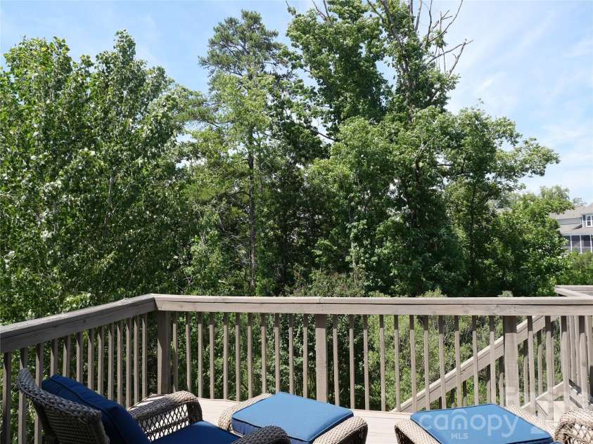 1404 Bryson Gap Drive, Fort Mill, SC 29715.  MLS# CAR4337751, YatesRealty ID 21911. Wooded view from the deck