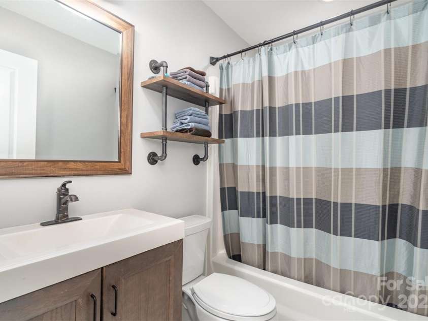 5701 Cedar Hill Drive, Monroe, NC 28110.  MLS# CAR4271384, YatesRealty ID 21913. Guest bathroom
