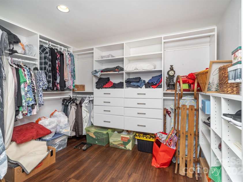 5701 Cedar Hill Drive, Monroe, NC 28110.  MLS# CAR4271384, YatesRealty ID 21913. Large primary walk-in closet with built-ins
