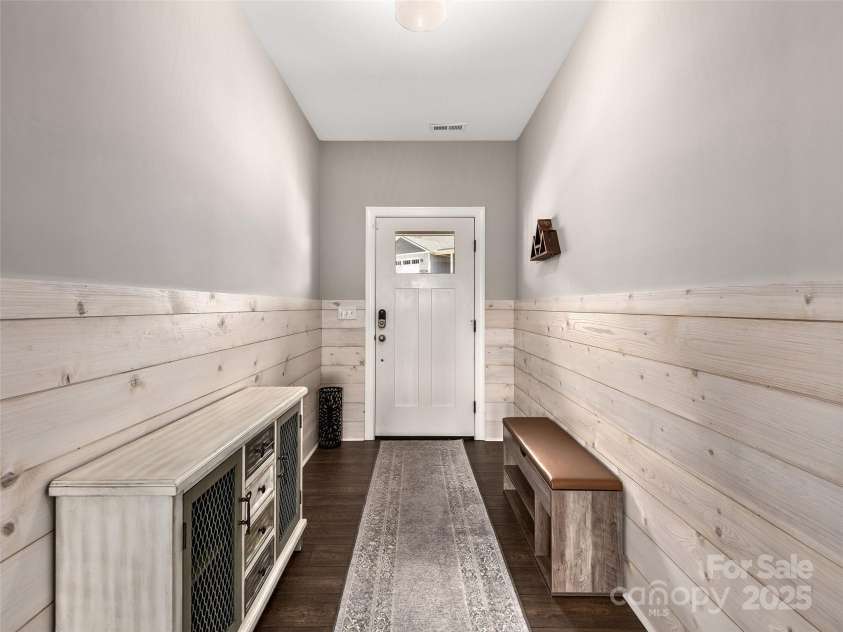 116 Whispering Wind Drive, Black Mountain, NC 28711.  MLS# CAR4245710, YatesRealty ID 21914. Stylish Wainscot Foyer