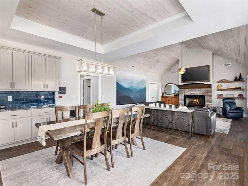 116 Whispering Wind Drive, Black Mountain, NC 28711.  MLS# CAR4245710, YatesRealty ID 21914. Wooden Tray Ceiling Above Dining