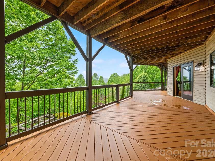 72 Tadpole Lane, Waynesville, NC 28785.  MLS# CAR4372726, YatesRealty ID 21915. Covered deck downstairs