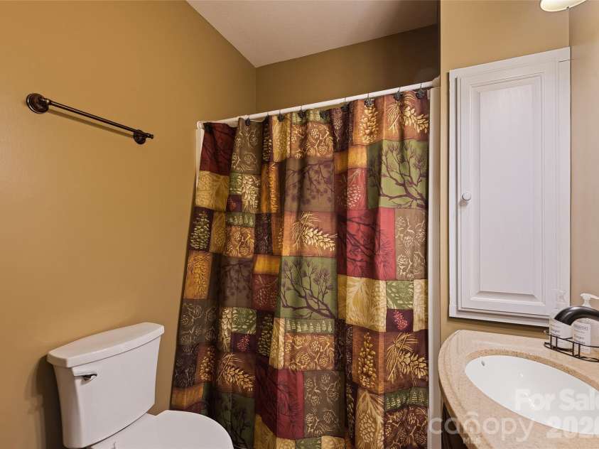 72 Tadpole Lane, Waynesville, NC 28785.  MLS# CAR4372726, YatesRealty ID 21915. Downstairs bath 