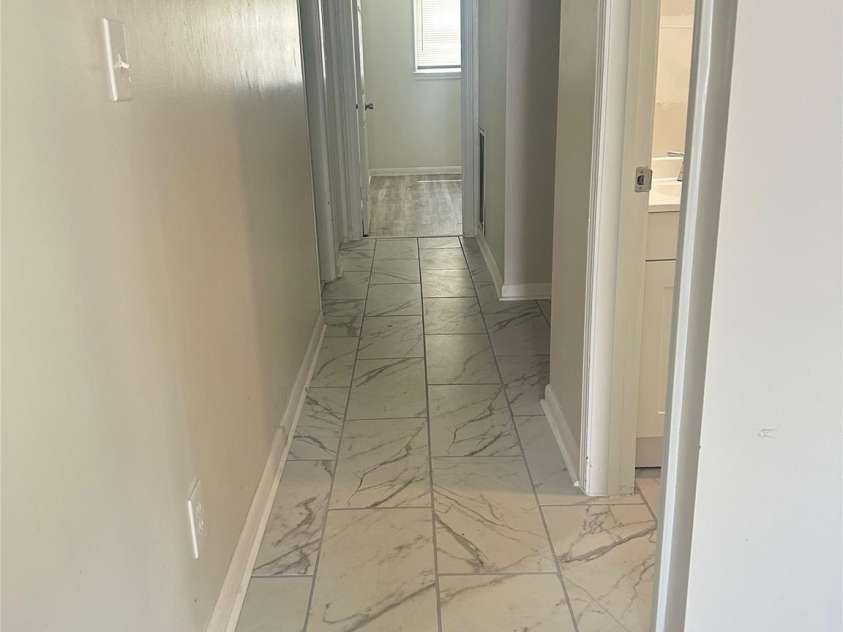 2021 Hollandale Drive, Gastonia, NC 28054.  MLS# CAR4310613, YatesRealty ID 2192. Hallway to bedrooms