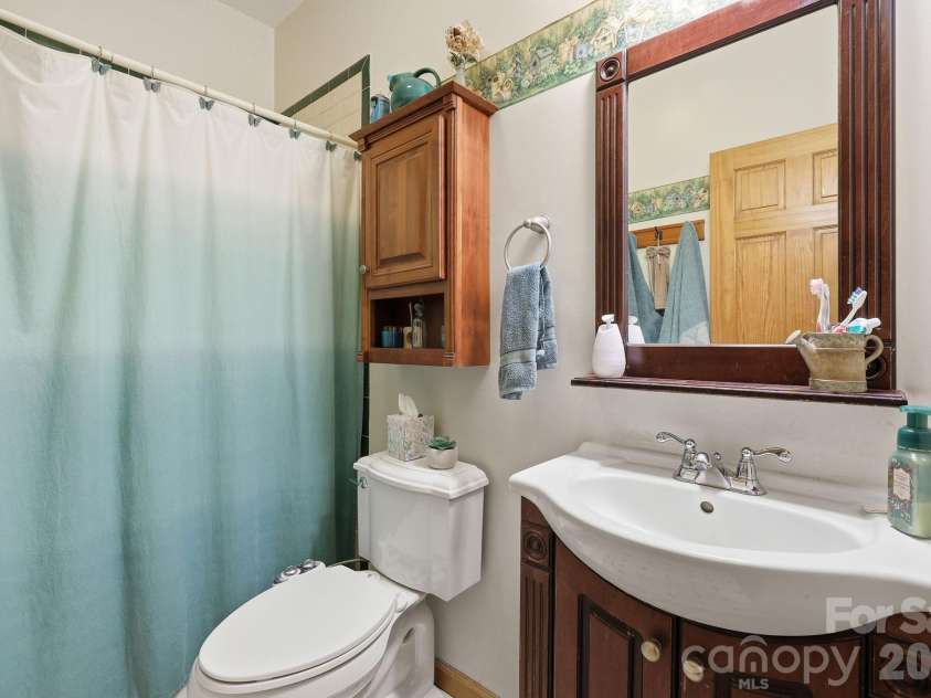 2225 Bald Creek Road, Clyde, NC 28721.  MLS# CAR4375884, YatesRealty ID 21920. Full bathroom on the main floor