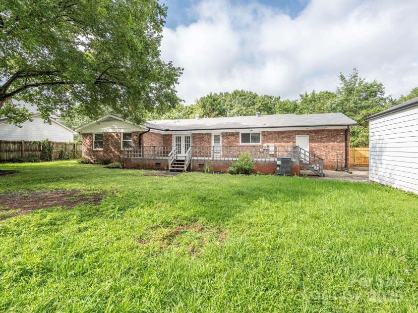 7416 Quail Ridge Drive, Charlotte, NC 28226.  MLS# CAR4270976, YatesRealty ID 21920. Back Exterior