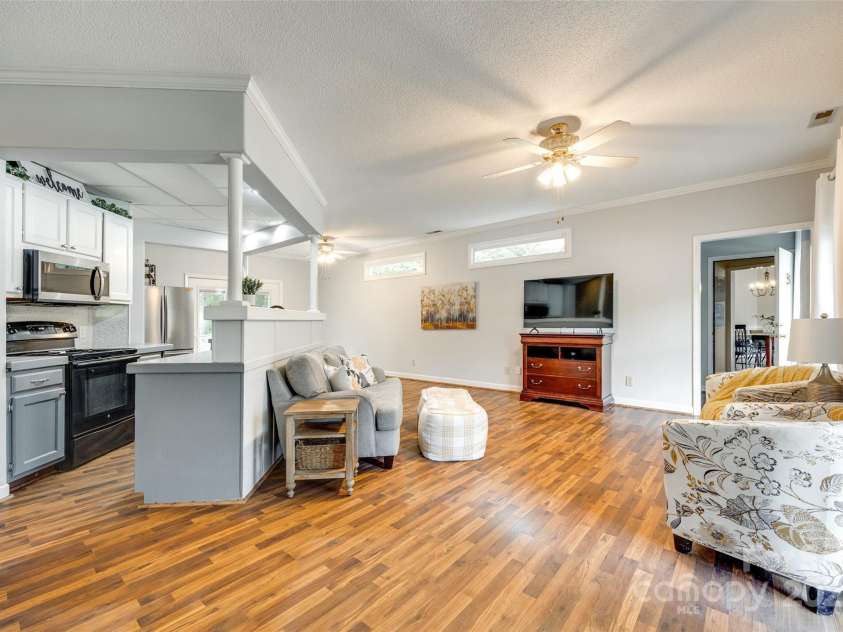 675 Ormand Road, York, SC 29745.  MLS# CAR4272867, YatesRealty ID 21923. Living room and kitchen - apartment wing