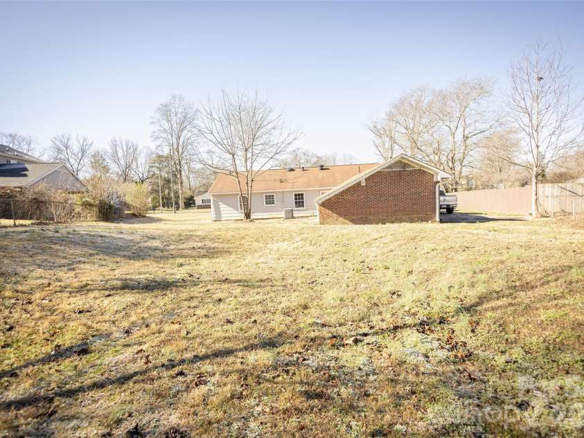 2220 Gaines Avenue, Gastonia, NC 28054.  MLS# CAR4336919, YatesRealty ID 21925. Back yard